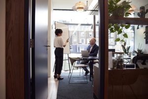 woman providing training in an office space